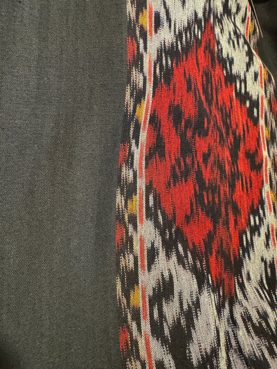 'Indah' Batiq Lined Cape, Charcoal. Each one has a unique ikat pattern lining.